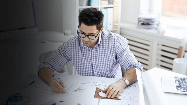 Engineer sitting at desk